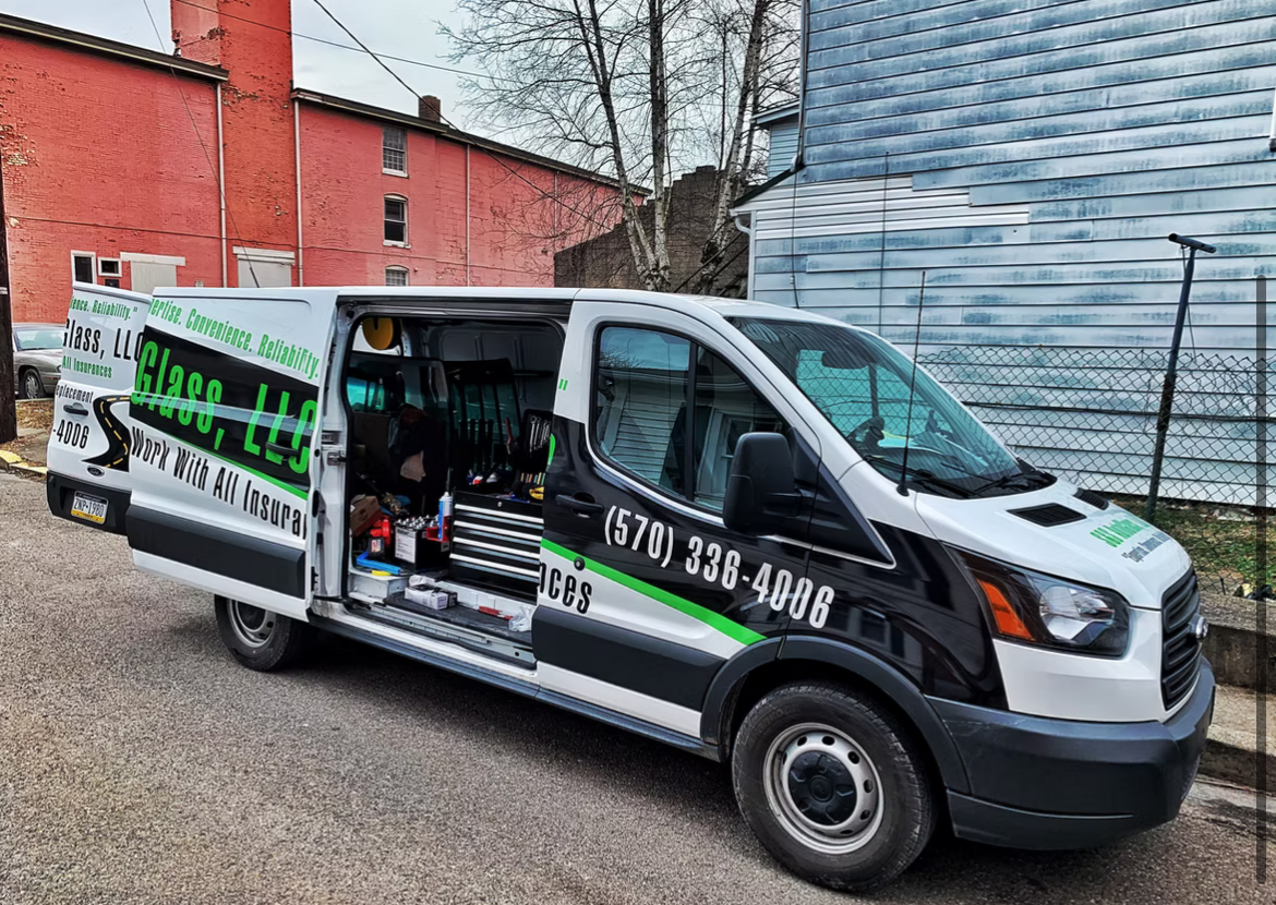 S&S AutoGlass work van with tools open — the shop on wheels