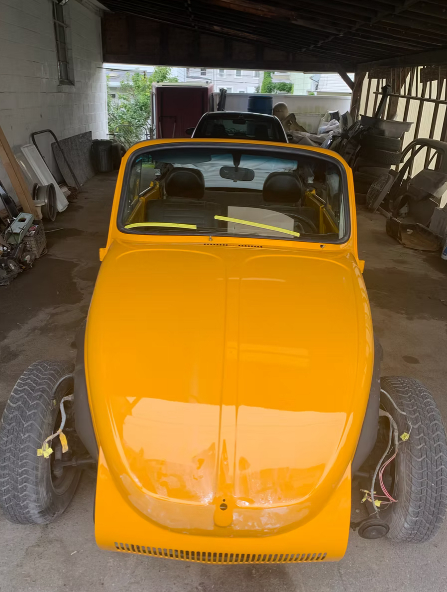 Yellow VW Beetle windshield replacement
